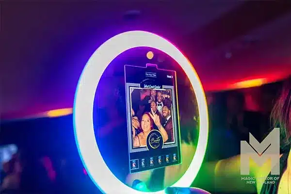 Roaming photo booth with a lit ring light at a cocktail hour event in New Hampshire