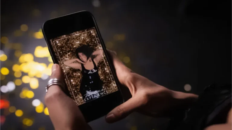 Paparazzi Photo and Video Experience. a woman recieving her photo booth photo on her phone. instant sharing.