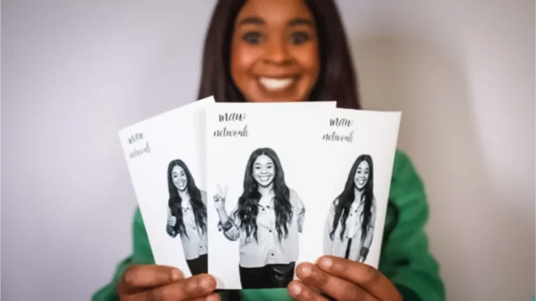 Paparazzi Photo and Video Experience. a woman holding her printed photos from the high quality photo booth.