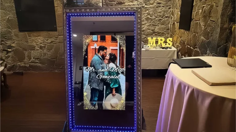 Magic Mirror Photo Booth - Magic Mirror Photo Booth-new england photo booth rental for wedding, a couple posing for a mirror photo booth