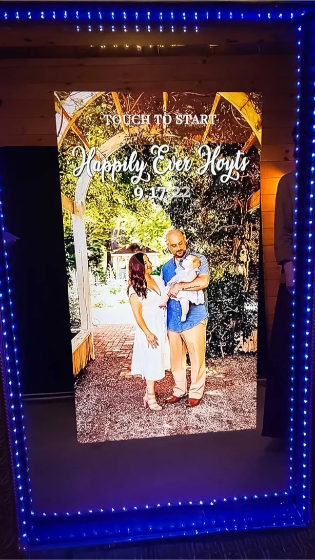 Magic Mirror Photo Booth - Magic Mirror Photo Booth-new england photo booth rental for wedding, a couple posing for a mirror photo booth