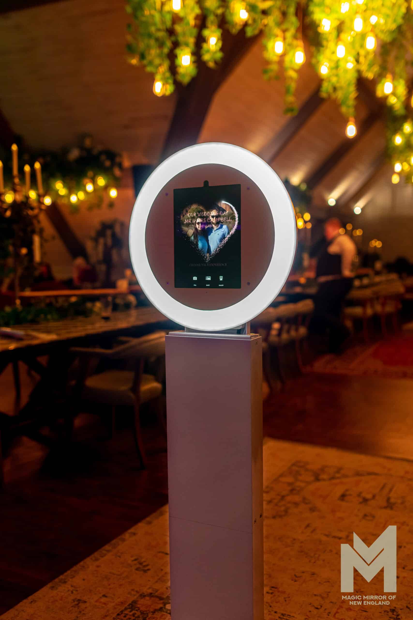 Dream Booth by Magic Mirror of New England with ring light and custom photo template at upscale event.