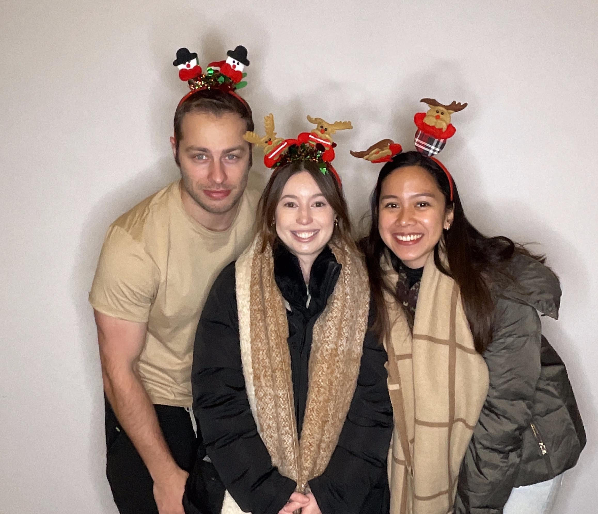 Photo Booth fun with guests wearing fun headbands holiday related