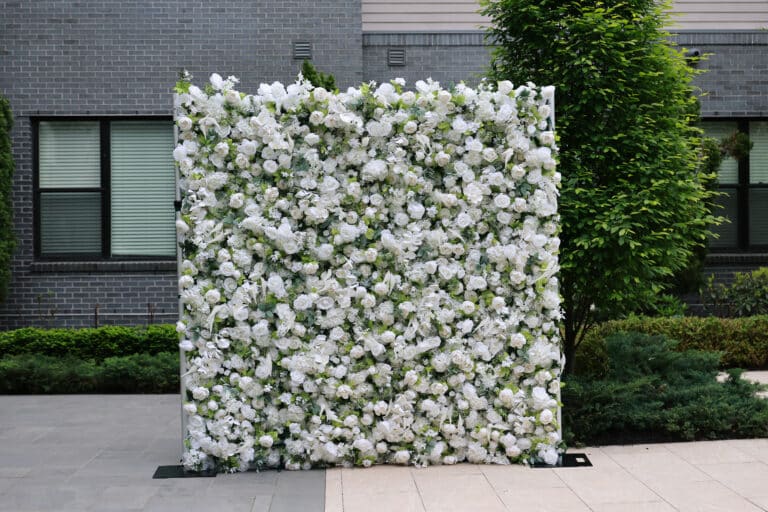 A white flower wall backdrop