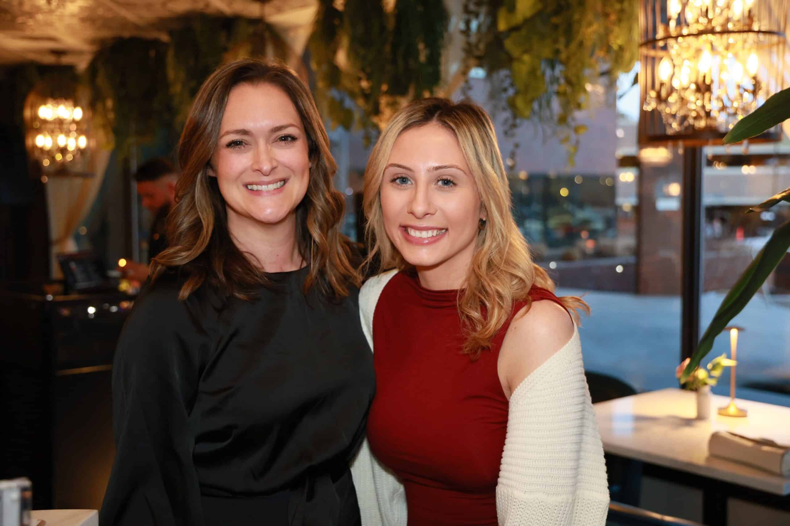 Two smiling women at an interactive event experience, Magic Mirror of New England photography.