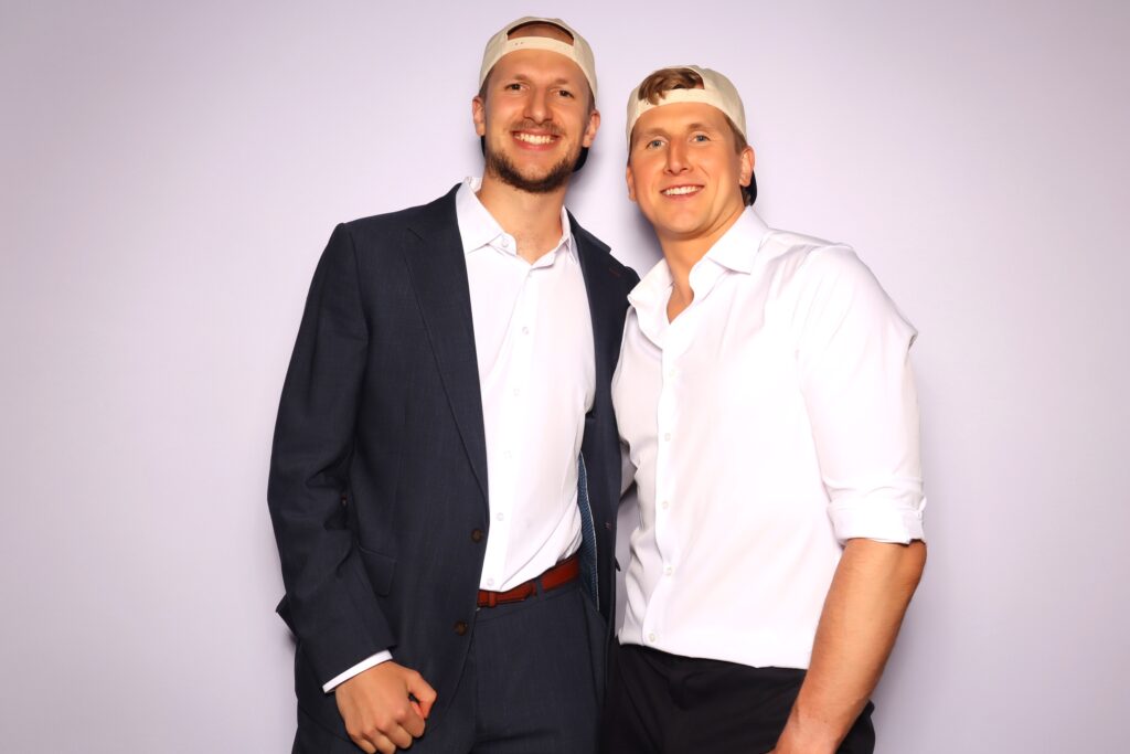 Two wedding guests posing together for a GLAM photo booth portrait at a wedding in Andover, MA