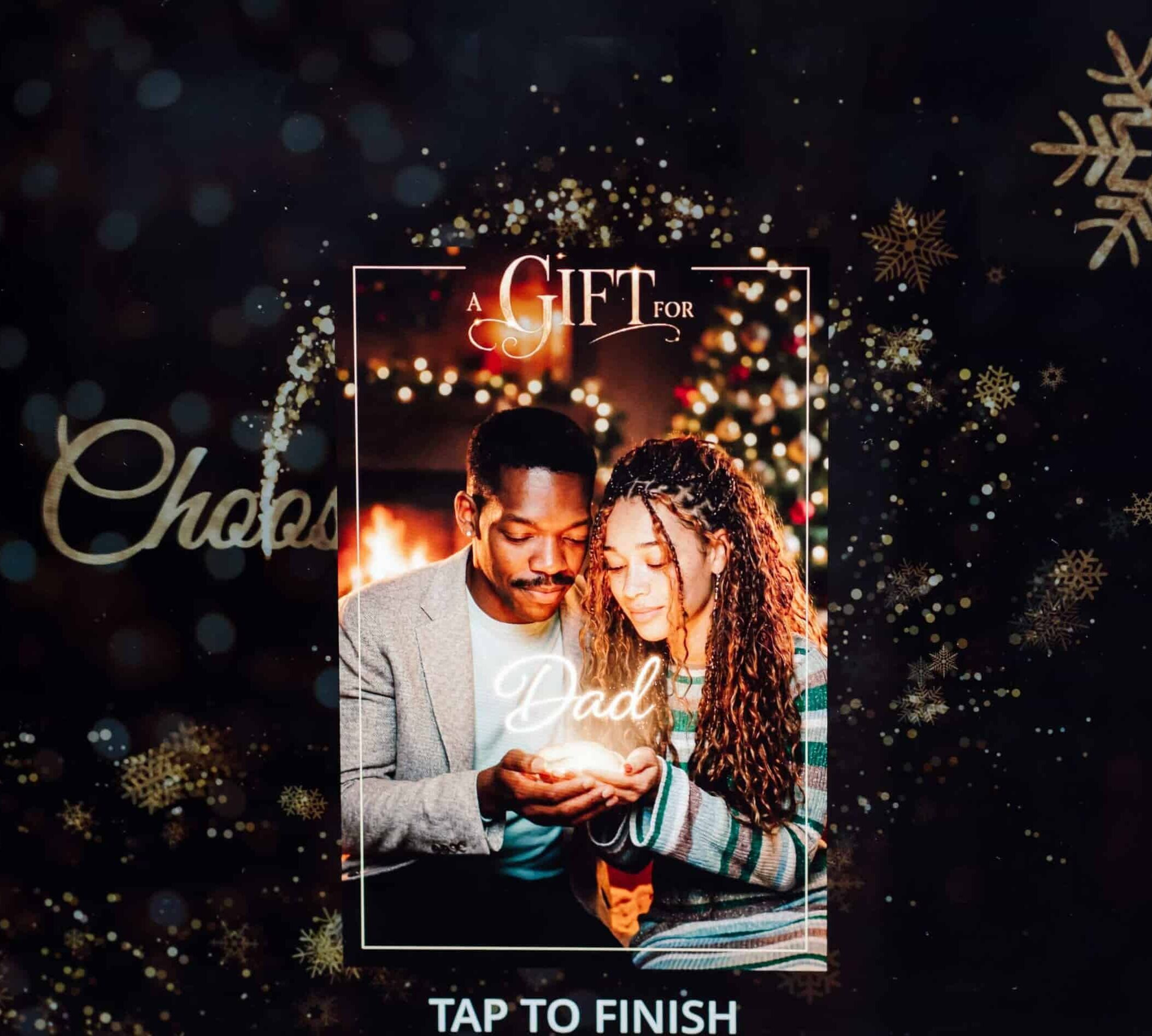 Guest holding their hands out presenting a name as a gift, gold frame overlay, Magic Mirror of New England holiday photo booth in New Hampshire