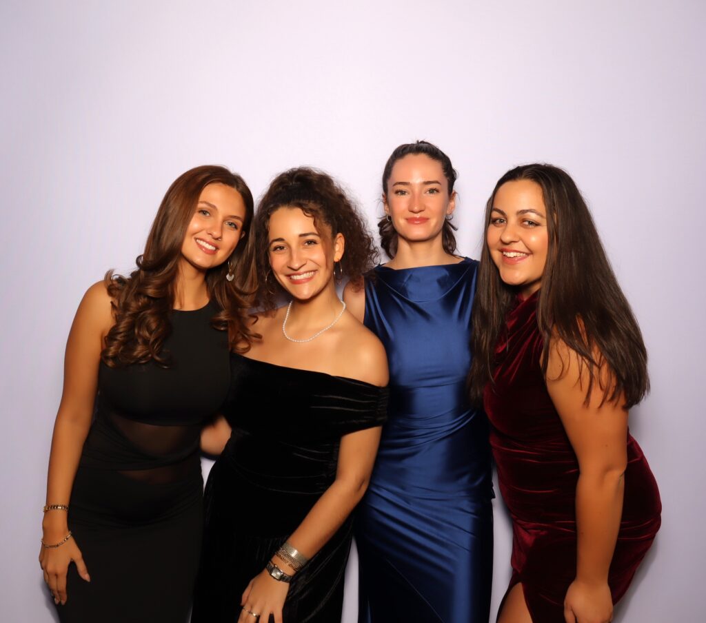 Guests posing in the photo booth at the Education First Winter Gala at the Fairmont Copley Plaza in Boston, MA