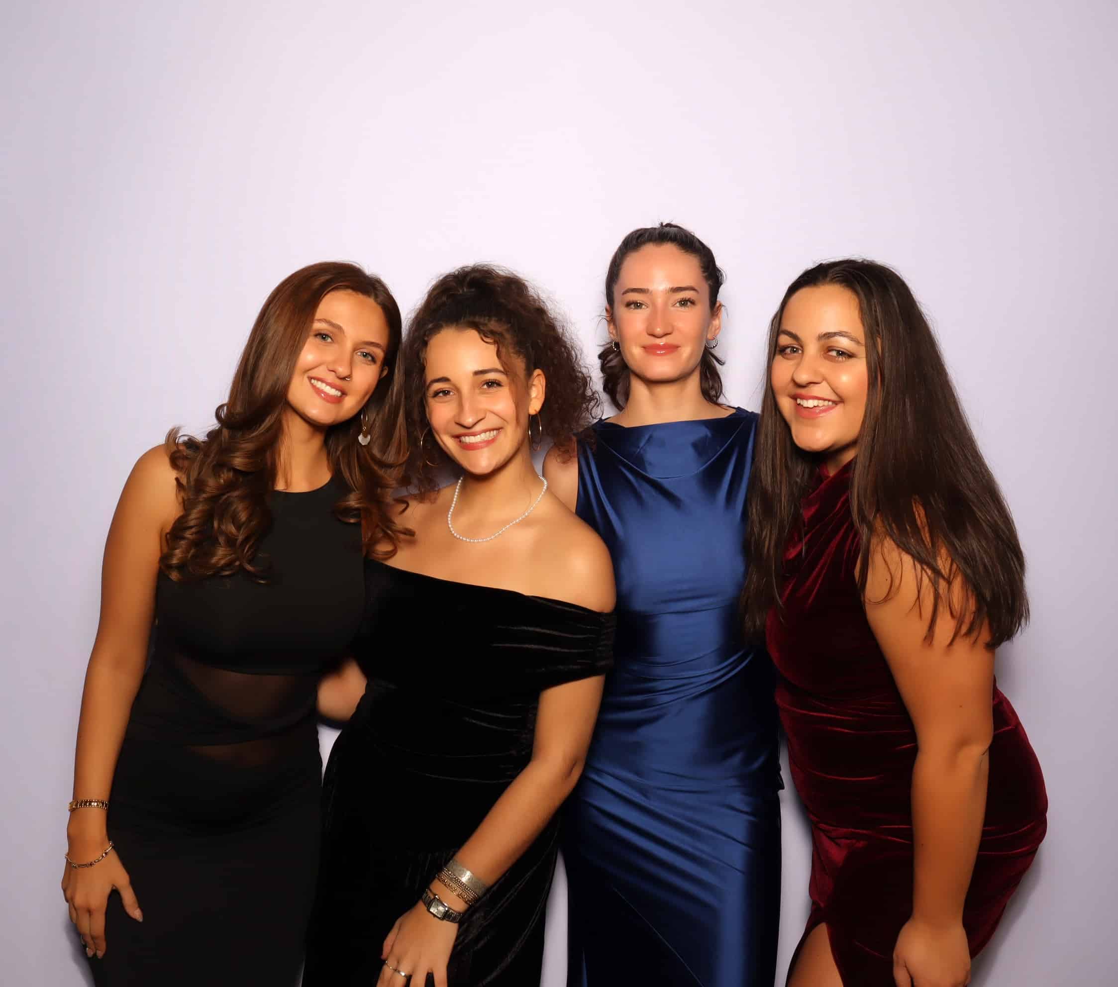 Guests posing in the photo booth at the Education First Winter Gala at the Fairmont Copley Plaza in Boston, MA