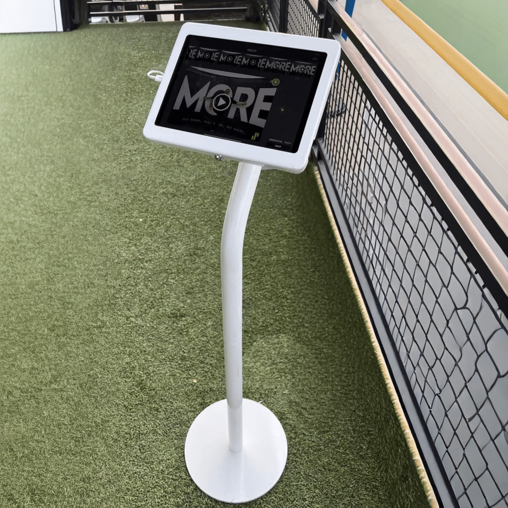 High-volume photo sharing station add-on on a stand where event guests can instantly text or email their photo booth photos