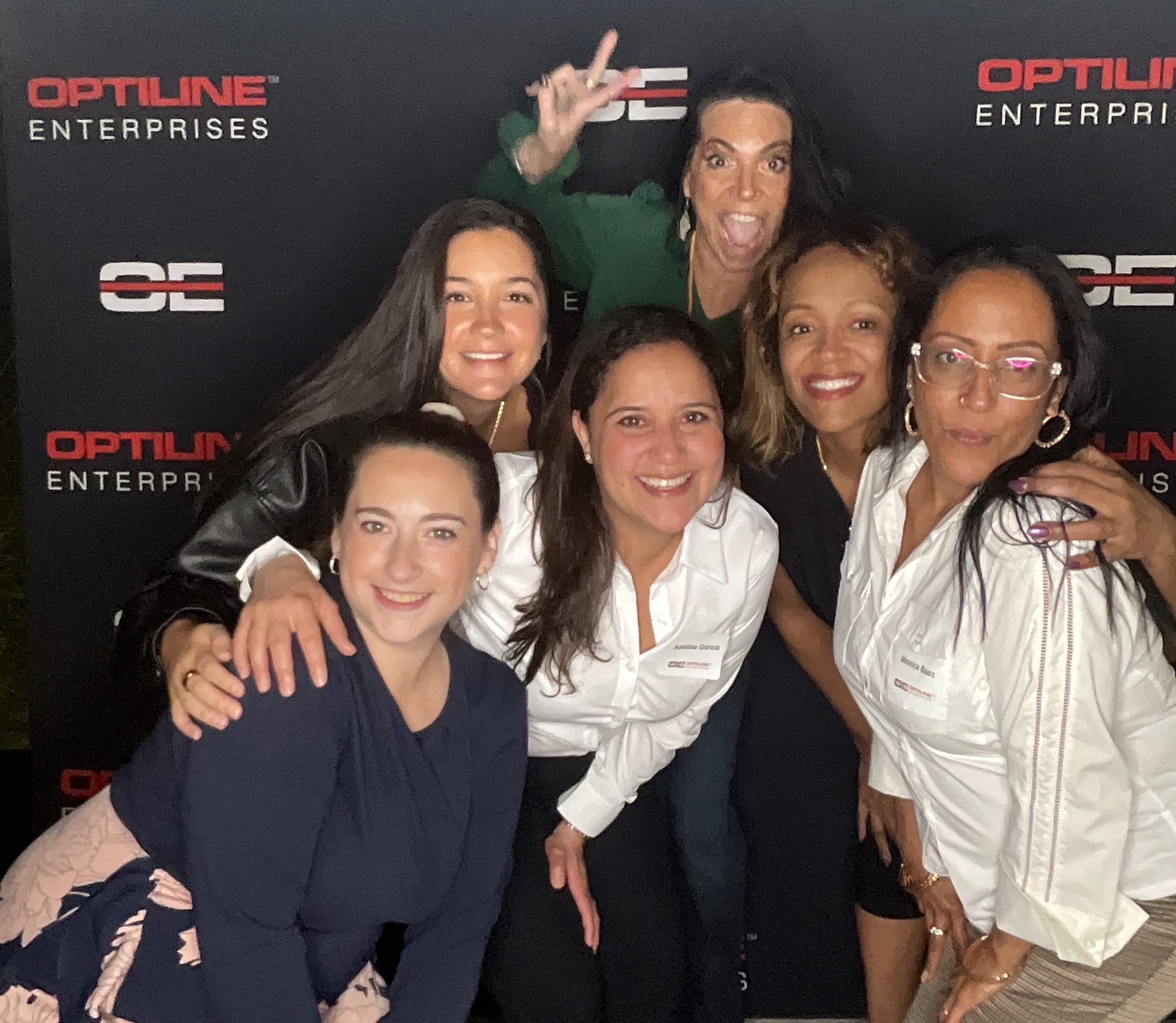 Group of colleagues being silly at the corporate photo booth at The Artisan Hotel at Tuscan Village, Salem NH