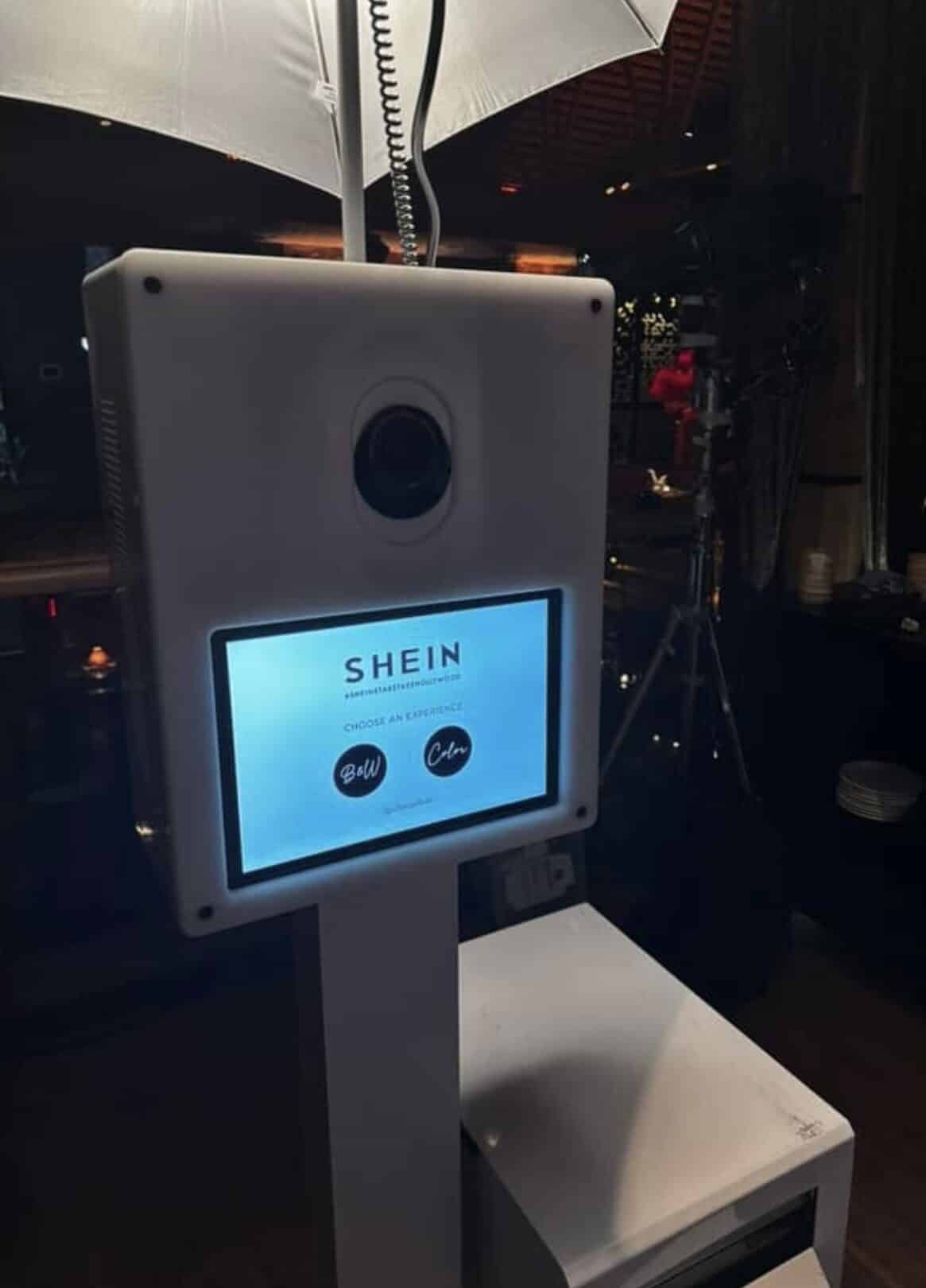 Studio photo booth with a custom branded touch screen start screen created for a SHEIN event